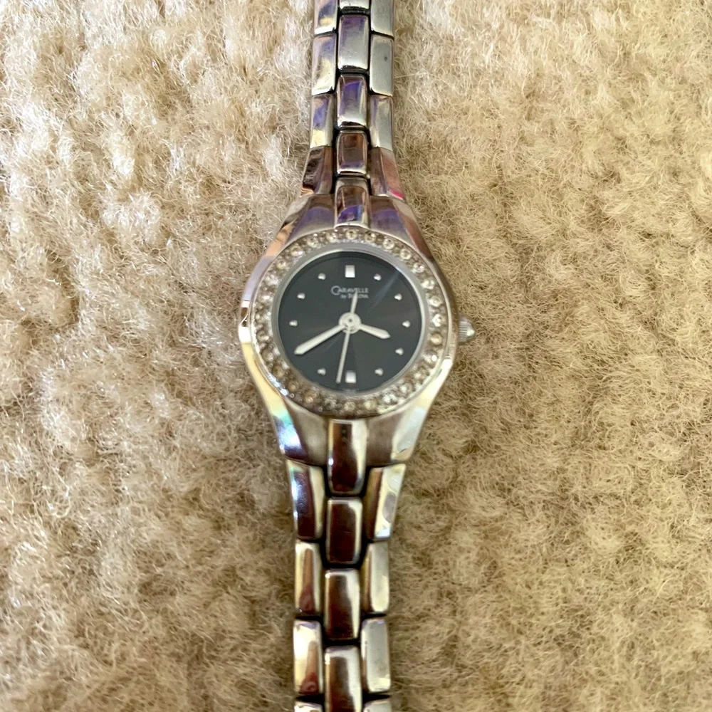 Bulova Silver Ladies Caravelle Black Dial Crystal Bezel Water Resistant Watch